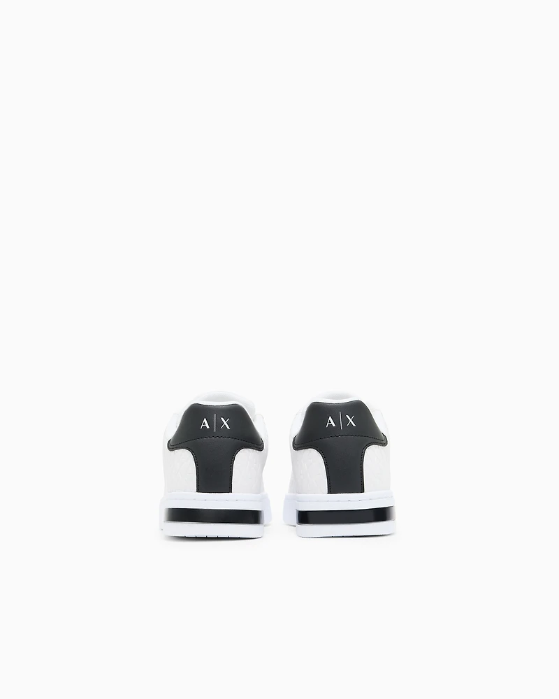 Lace-up sneakers with allover embossed logo