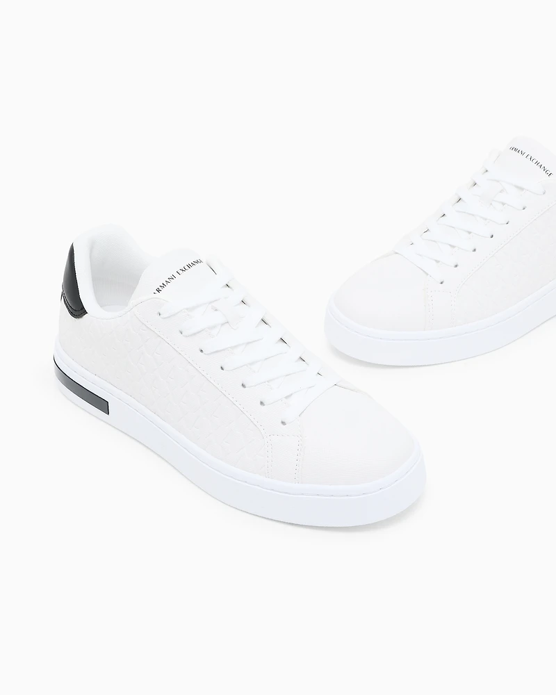 Lace-up sneakers with allover embossed logo