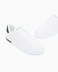 Lace-up sneakers with allover embossed logo