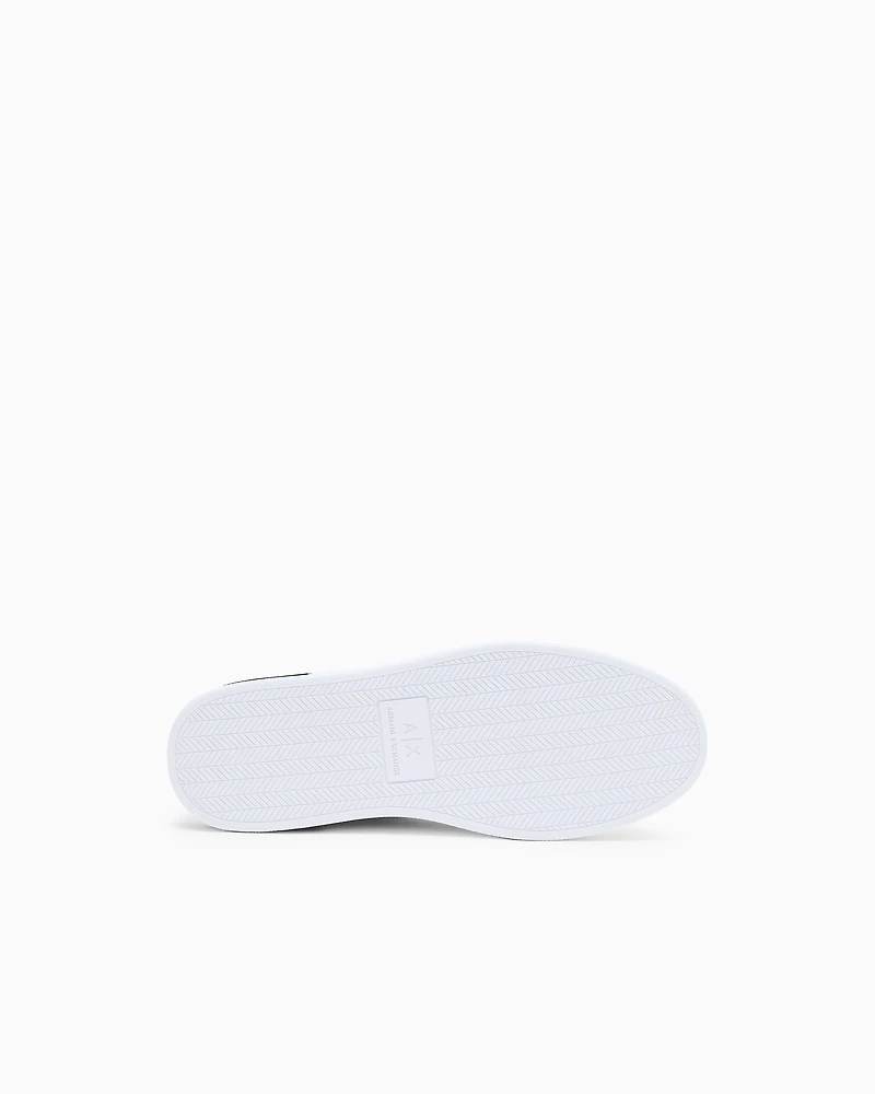 Lace-up sneakers with allover embossed logo