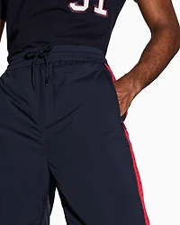 Trousers with side stripes