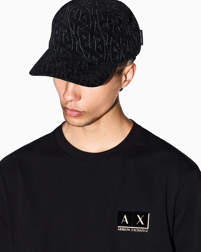 Visor cap with embroidered logo