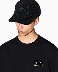 Visor cap with embroidered logo