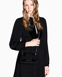 Small shoulder bag with shaped logo