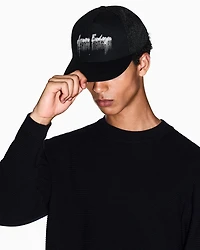 BLACK VISOR CAP WITH EMBELLISHED LOGO