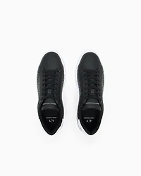Lace-up sneakers with allover embossed logo