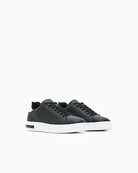 Lace-up sneakers with allover embossed logo