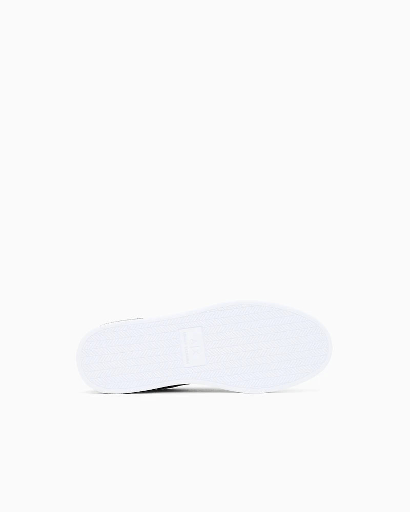 Lace-up sneakers with allover embossed logo
