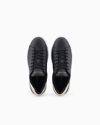 Sneakers with matching embroidered logo and metal detail