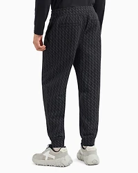 Jogger pants fabric with allover logo pattern