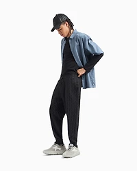 Jogger pants fabric with allover logo pattern