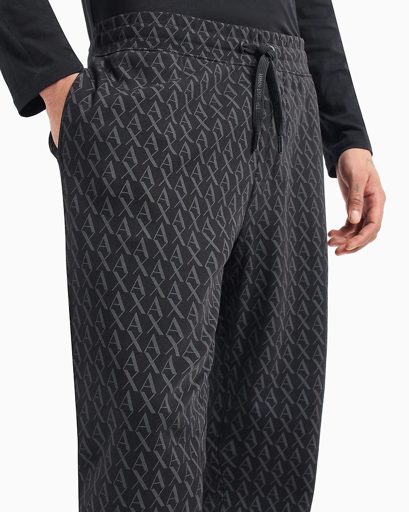 Jogger pants fabric with allover logo pattern