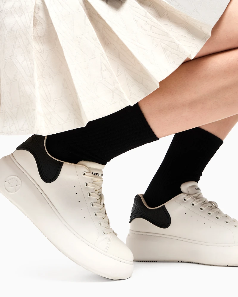 Sneakers with high sole