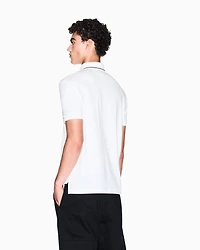 Slim fit polo shirt with logo and piping
