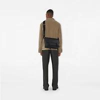 Embossed Check Buckled Messenger Bag​ in Black - Men, Leather | Burberry® Official