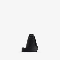 Embossed Check Buckled Messenger Bag​ in Black - Men, Leather | Burberry® Official