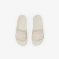Logo Slides in Sandy beige/candyfloss pink - Women | Burberry® Official