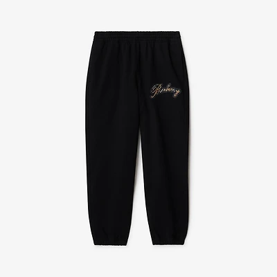 Check Cursive Logo Cotton Jogging Pants in Black - Men | Burberry® Official