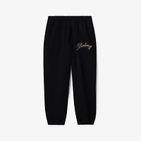 Check Cursive Logo Cotton Jogging Pants in Black - Men | Burberry® Official