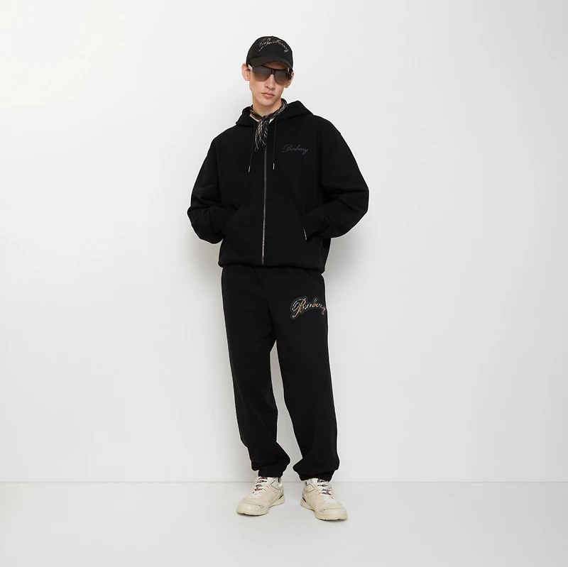 Check Cursive Logo Cotton Jogging Pants in Black - Men | Burberry® Official