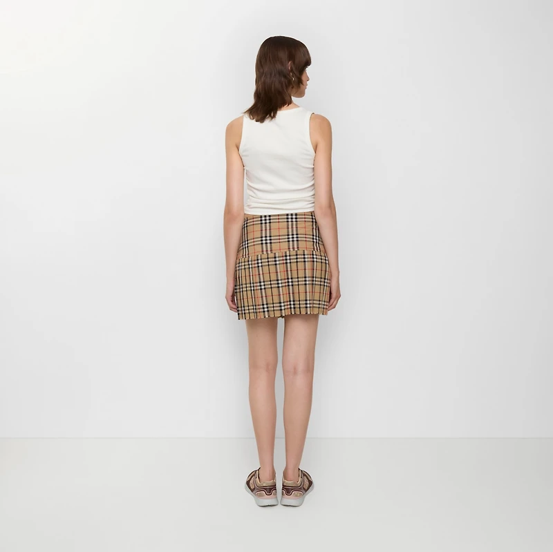 Pleated Check Wool Mini Kilt in Archive beige - Women | Burberry® Official