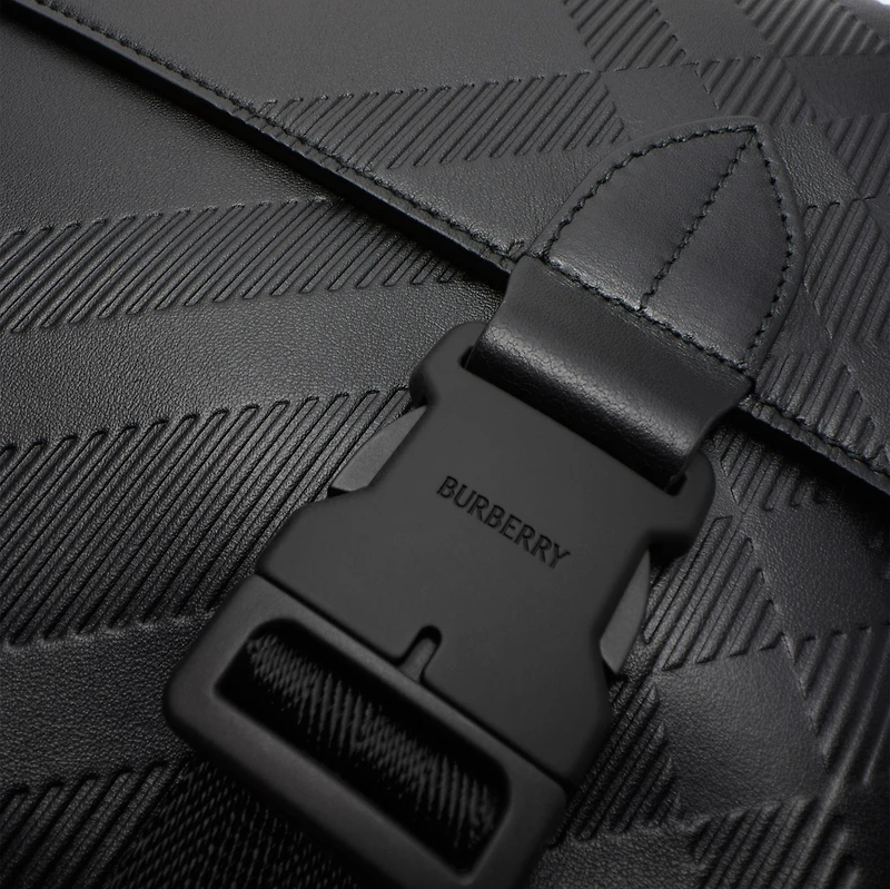 Embossed Check Buckled Messenger Bag​ in Black - Men, Leather | Burberry® Official