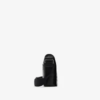 Embossed Check Messenger Bag​ in Black - Men | Burberry® Official
