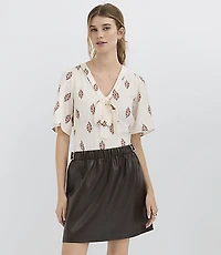 Side Buckle Faux Leather Mini Skirt