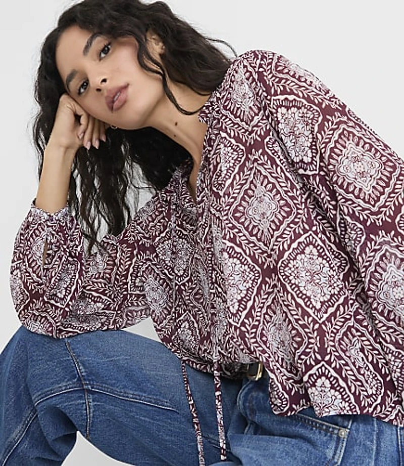 Medallion Shirred Ruffle Tie Neck Blouse