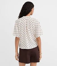 Dotted Ruffle Cuff Tie Neck Blouse