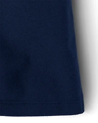 Polo en piqué d'uniforme pour fille