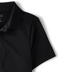 Polo de performance uniforme pour garçon