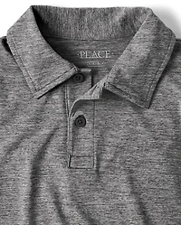 Polo de performance chiné pour garçon