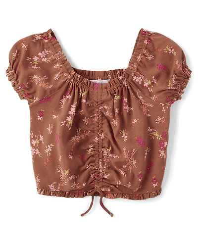 Haut fleuri cintré sur le devant pour fille