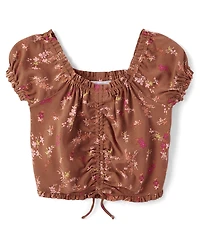 Haut fleuri cintré sur le devant pour fille