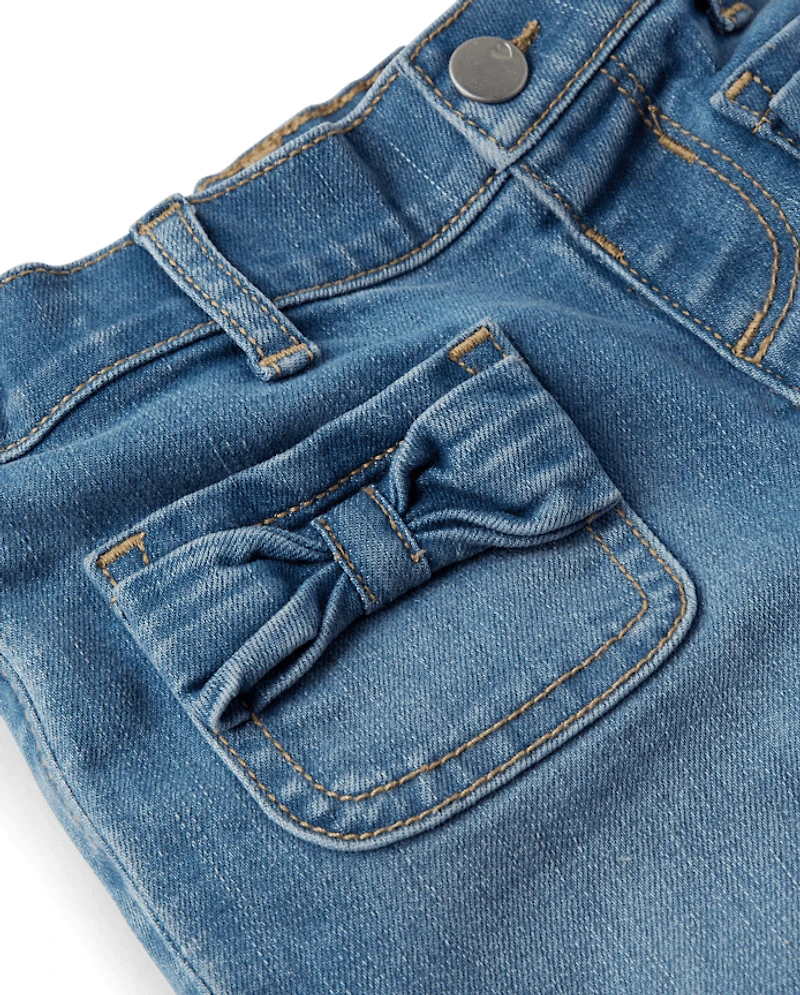 Jean large à nœud pour petite fille