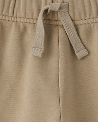 Pantalon cargo ample en polaire premium teinte pièce pour garçon