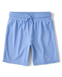 Short de sport enfant à séchage rapide et bandes latérales en maille