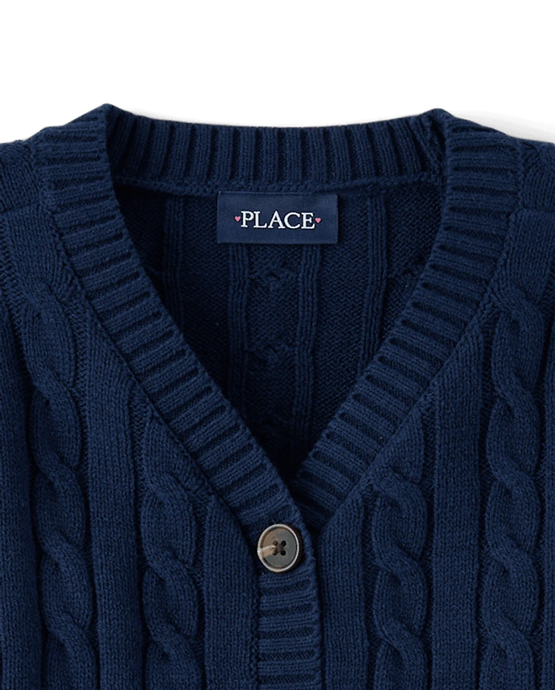 Gilet en maille torsadée pour fille