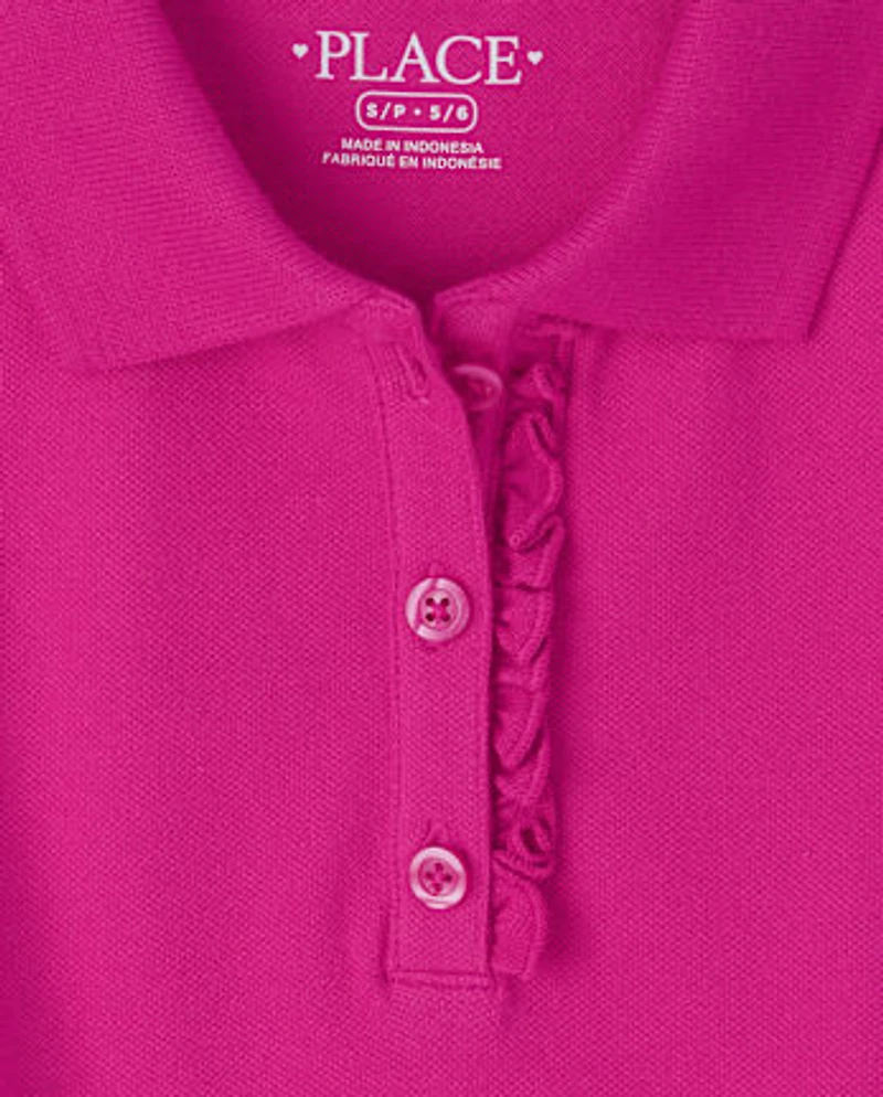 Polo en piqué d'uniforme à volants pour fille