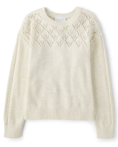 Pull en maille torsadée pour fille