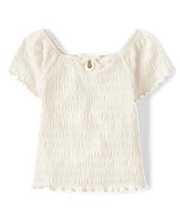 Haut smocké à trou de serrure pour fille