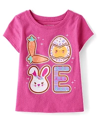 T-shirt graphique « Les bébés et les petites filles adorent biscuits de Pâques »