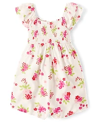 Combinaison à smocks fleurie pour fille