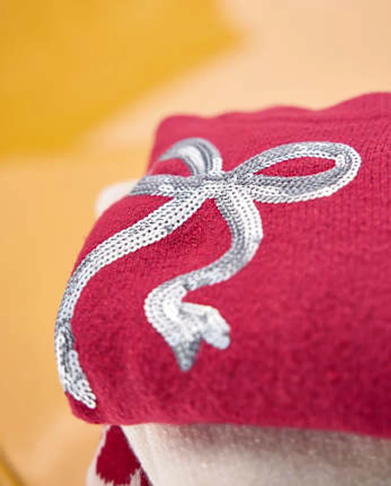 Pull à paillettes et nœud pour fille