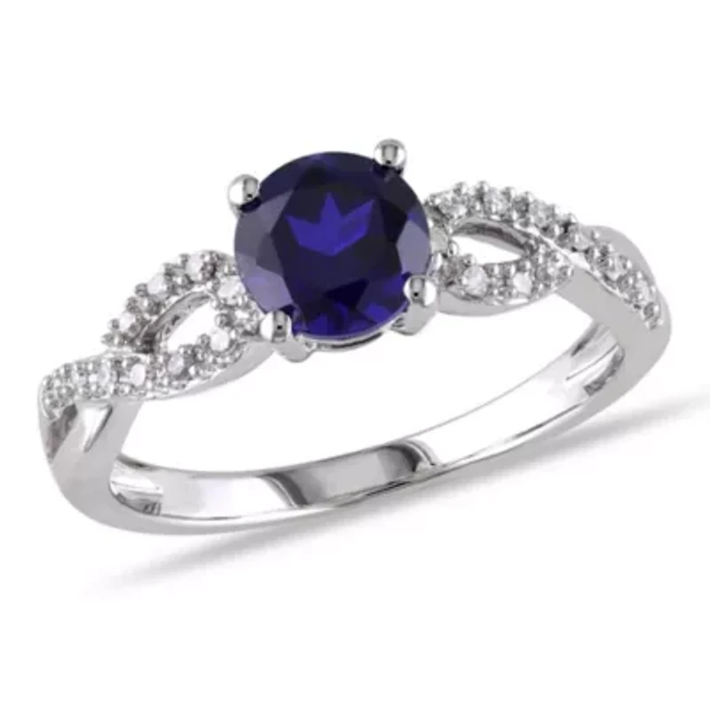 1 ct. t.g.w. Created Blue Sapphire and 1/10 t.w. Diamond Infinity Ring 10K White Gold