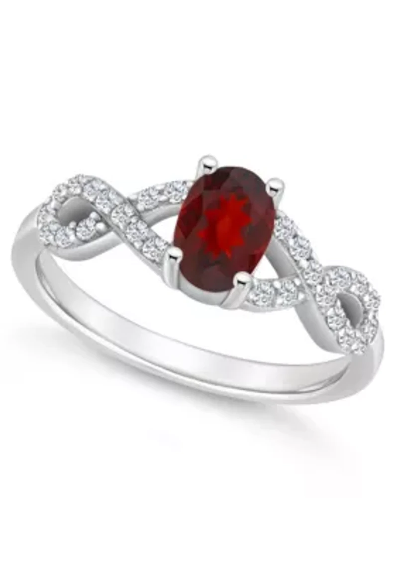 Sterling Silver 7x5mm Oval Garnet and White Topaz Accent Ring