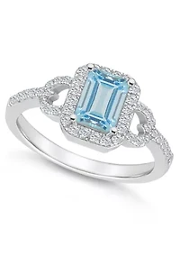 Sterling Silver 7x5mm Emerald Cut Sky Blue Topaz and White Accent Ring