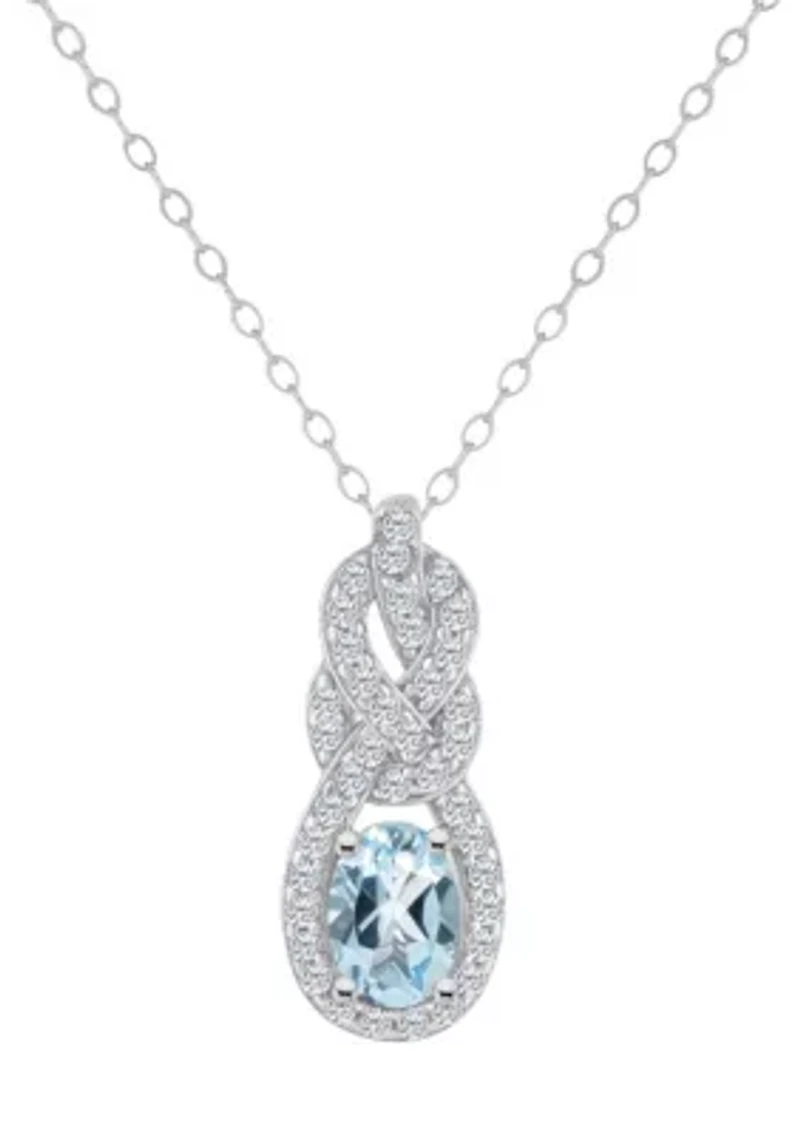 Sterling Silver 7x5mm Oval Sky Blue Topaz and White Topaz Accent Pendant Necklace