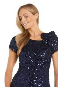 Missy Long Stretch Sequin Cap Sleeve Gown with Flower Detail